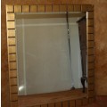 A STUNNING LARGE BEVELLED MIRROR FINISHED IN A GOLDEN FRAME 113CM X 96CM