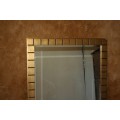 A STUNNING LARGE BEVELLED MIRROR FINISHED IN A GOLDEN FRAME 113CM X 96CM