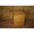 A FANTASTIC OAK FINISHED CREDENZA WITH A STATIONARY DRAWER OR PERFECT TO PUT YOUR CD COLLECTION IN