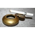 This is a gorgeous small clean brass ashtray with a flip top. The hinged lid has and flips back!!!