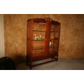 This is a truly stunning antique display cabinet.  It has fantastic detail on the front sides.