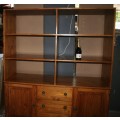 A VERY LARGE SOLLID WOOD SHELF UNIT WITH TWO DOORS AND FOUR DRAWERS - STUNNING WALL UNIT OR BOOKCASE