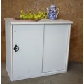 A GORGEOUS CRISP WHITE SHABBY CHIC SLIDING DOOR CUPBOARD WITH A SHELF.