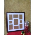 A VERY LARGE WOODEN FRAMED PICTURE FRAME - FOR ALL THE FAMILY PHOTOS