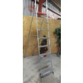 A TALL ALUMINUM FOLD UP LADDER 2.5 m- EASY TO STORE AND HANDY TO HAVE