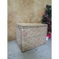 AN A AMAZING VINTAGE LARGE WEAVED BASKET/KIST - PERFECT FOR TOYS OR LINEN - INFRONT OF A BED