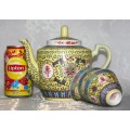 This beautiful Famille Rose Yellow Tea Pot with three matching tea cups. The Chinese character