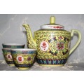 This beautiful Famille Rose Yellow Tea Pot with three matching tea cups. The Chinese character