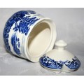 This is a William James English Porcelain Sugar bowl. The blue and white colors are of two people