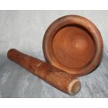 This is a beautiful antique Pottery mortar and pestle. It's handmade and hand carved - very useful