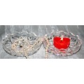 Here is a small, beautiful, round cut glass trinket dish with an unusual saw toothed edge on both