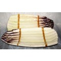 Six hand painted ceramic plates in the form of asparagus spears. Gradient colors from pale cream to