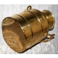 A gorgeous brass milk can clean and shiny will make a fantastic vase in that vintage shabby chic hou