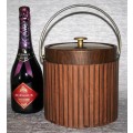 Entertain in mid century modern style with this vintage ice bucket. This sophisticated Kraftware