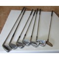 SEVEN GOLF CLUBS FOR BAR DECOR OR FOR THE KIDS TO PLAY WITH BID PER EACH