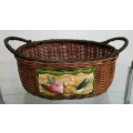 A Gorgeous Country style Oval Wicker Basket with Handles and Ceramic decorative plaque
