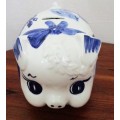 A marvelous Vintage and cute - blue delft, hand painted pig with slot on top for bank.
