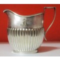 A MARVELOUS - Sheffield Style Milk Creamer that really speaks to the art deco style.