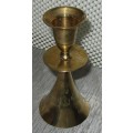 A MARVELOUS BRASS CANLE HOLDER ON TOP AND BELL ON THE BOTTOM SIDE