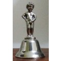 A CHARMING SILVER PLATED DINNER BELL WITH A RINGER THE HANLE IS A BOY ON TOP - DIFFERENT