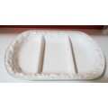 A STUNNING CRISP WHITE SERVING PLATER WITH MARVELOUS RAISED DECORATIVE EDGING