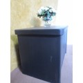 A TRENDY CHABBY CHIC HEAVY ENTERTAINMENT UNIT OR SIDE BOARD FINISHED IN A BLACK SPARROW CHALK PAINT