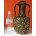 A MARVELOUS LARGE ORNATE CERAMIC/POTERY VASE FINISHED IN A STUNNING DESIGN