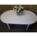 A OVAL SIX SEATER OUSIDE TABLE - LEGS CAN PULL OUT FOR EASY STORAGE