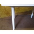 A OVAL SIX SEATER OUSIDE TABLE - LEGS CAN PULL OUT FOR EASY STORAGE