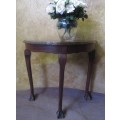 A BEAUTIFUL VINTAGE BALL & CLAW IMBUIA HALF MOON DISPLAY/OCCASIONAL TABLE. GORGEOUS IN AN ENTRANCE!!