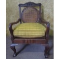 A beautiful solid Wood Ball & Claw parlour single couch with wicker backrest in great condition!!!