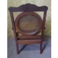 A beautiful solid Wood Ball & Claw parlour single couch with wicker backrest in great condition!!!