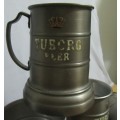 Two wonderful bar collectible in great condition. Tuborg Pewter Beer Mugs with see threw bottom i