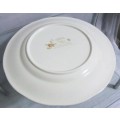 I'm pleased to offer this beautiful vintage dinner plate. This set was made by Mikasa -