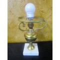 This is a gorgeous brass lamp with a large finial and a marble base
