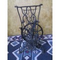 A ELEGANT ANTIQUE SINGER STAND - ADD A TOP AND USE IT FOR A BASIN STAND WILL BE A CONVERSASION PIECE