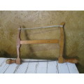 A lovely antique bow cut saw in wonderfully weathered condition with a great primitive look and feel
