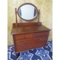 A magnificent Antique 4 drawer dressing table with a large bevelled mirror - on original casters