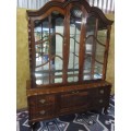 Spectacular large "gabled" ball and claw display cabinet with glass shelves and four drawers & door