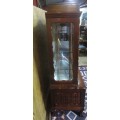 Spectacular large "gabled" ball and claw display cabinet with glass shelves and four drawers & door