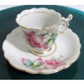 A ELGANT & STYLISH DEMITASSE CUP AN SAUCER BEAUTIFULLY DECORATED WITH PINK ROSES -
