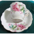 A ELGANT & STYLISH DEMITASSE CUP AN SAUCER BEAUTIFULLY DECORATED WITH PINK ROSES -
