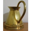 This is a stunning vintage Brass jug with firm handle. It does have wear which gives it its charm