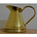 This is a stunning vintage Brass jug with firm handle. It does have wear which gives it its charm