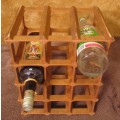 A GOOD SIZE WINE RACK FOR THE KITCHEN OR PUB OR DRINKING TROLLEY ON THE PATIO