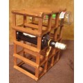 A GOOD SIZE WINE RACK FOR THE KITCHEN OR PUB OR DRINKING TROLLEY ON THE PATIO