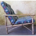 A FANTASTIC SINGLE SEATER CANE COUCH FOR THE PATIO