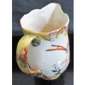 Being offered is a marvelous English pitcher marked 1045-2 MADE IN ENGLAND BESWICK ENGLAND.