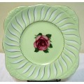 This cake or sandwich plate by Royal Grafton is so pretty with green porcelain and a large Pink Rose
