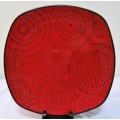 A GORGEOUS VIBRANT RED SERVING PLATE WITH A BEAUTIFUL PATERN INSIDE
